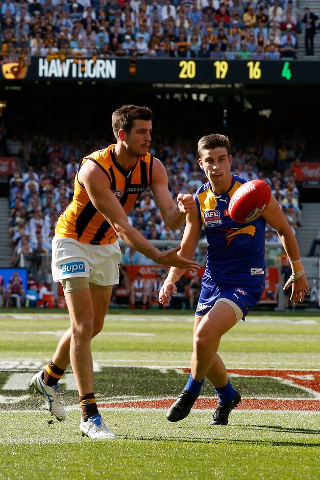 2015 Toyota AFL Grand Final - Hawthorn v West Coast MELBOURNE, AUSTRALIA - OCTOBER 3: Ben Stratton of the Hawks handballs during the 2015 Toyota AFL Grand Final match between the Hawthorn Hawks and the West Coast Eagles at the Melbourne Cricket Ground, Melbourne, Australia on October 3, 2015. (Photo by Darrian Traynor/AFL Media)